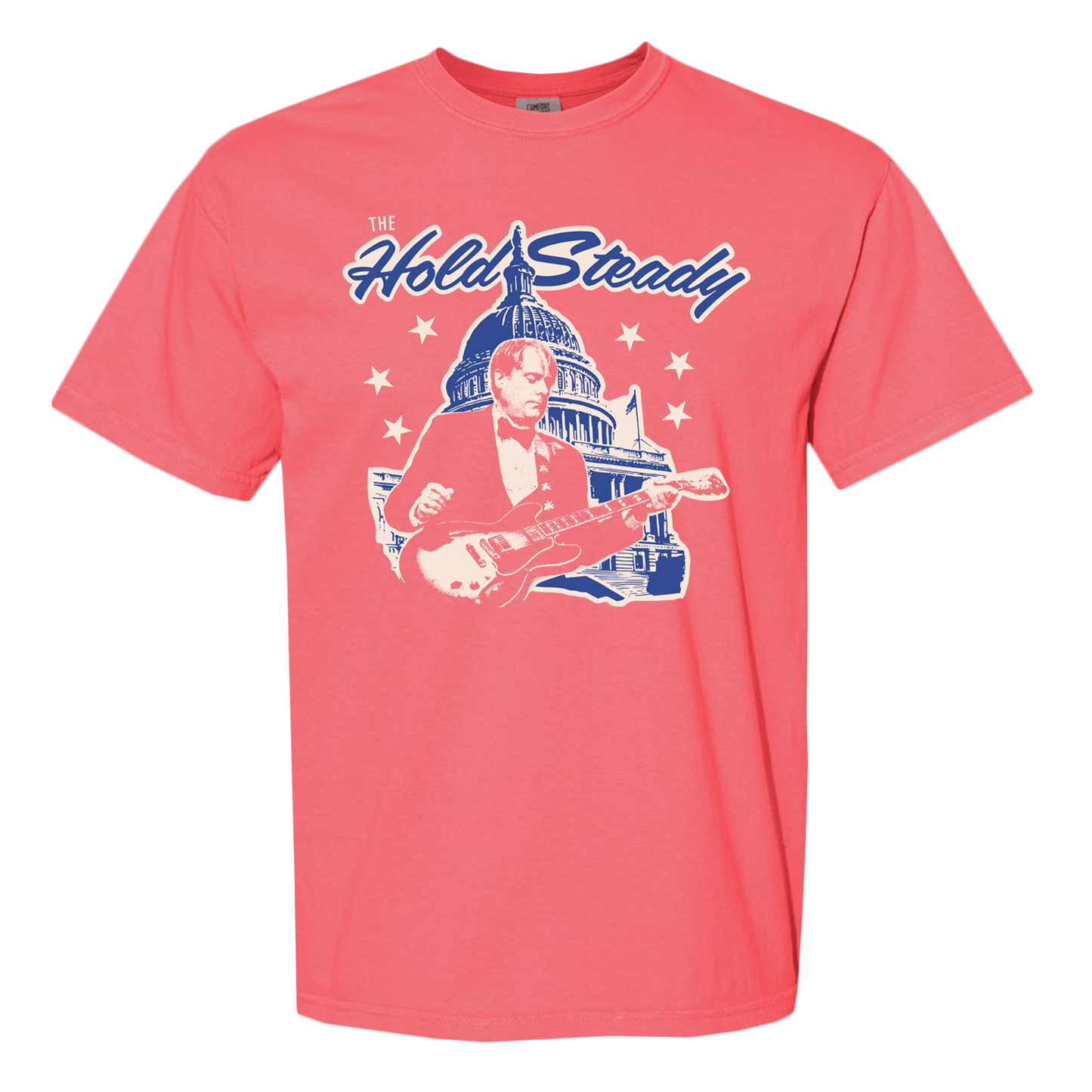 Coral Comfort Colors T-shirt by The Hold Steady, featuring a man playing electric guitar before the U.S. Capitol, with The Hold Steady in white and blue text above. Garment-dyed for a soft, vintage feel.