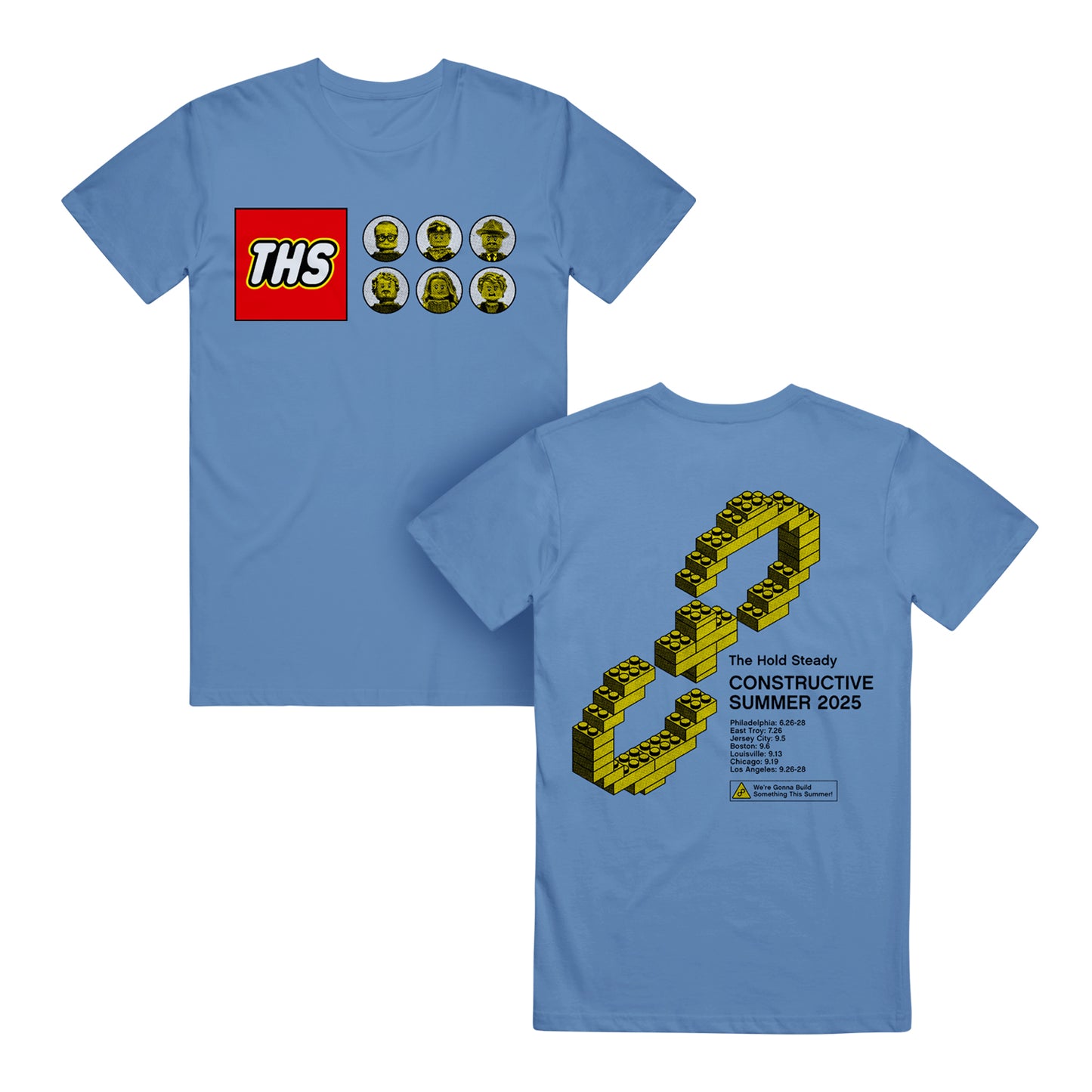 A blue Comfort Colors T-shirt from The Hold Steady with a Lego-style THS logo and six minifigure faces on the front, plus a large Lego infinity symbol and 2025 Constructive Summer event details on the back.