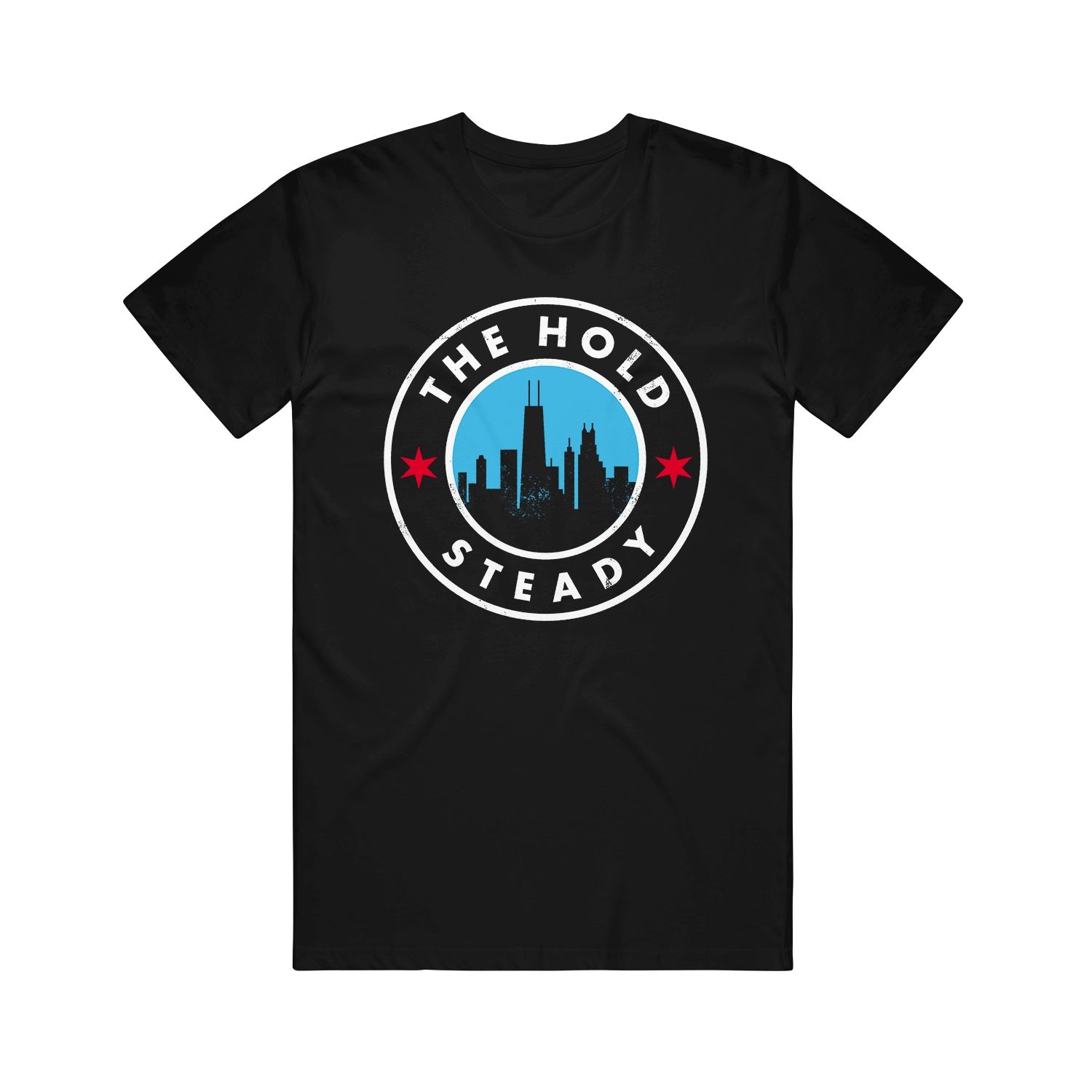 Black Comfort Colors shirt with a circular logo showing a city skyline, two red stars, and "The Hold Steady" in white lettering around the circle.