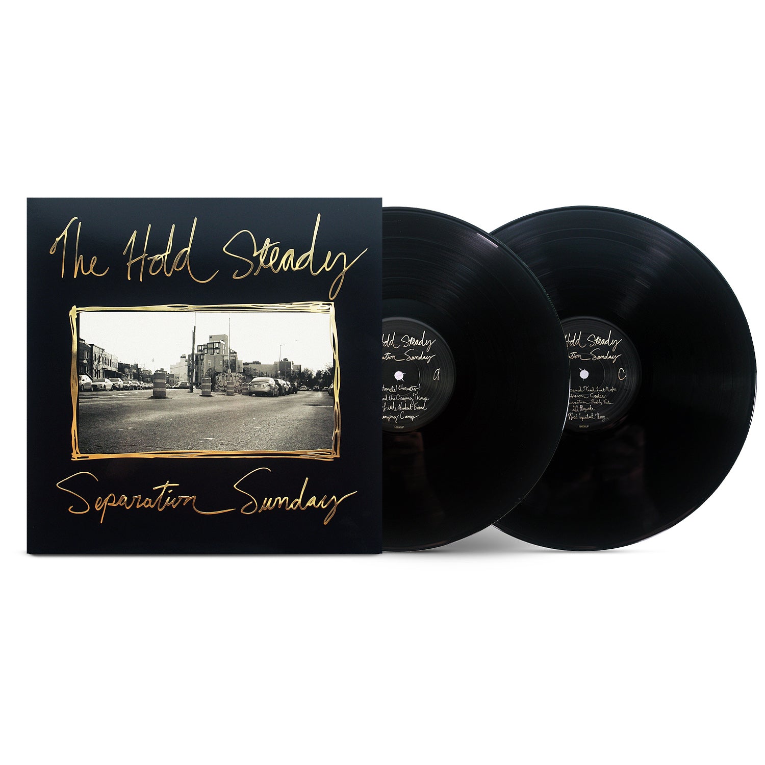 Two black vinyl records partly slide from a black cover reading "The Hold Steady" and "Separation Sunday" in yellow script, with a sepia city street image. Includes tracks like "Charlemagne in Sweatpants." Brand: The Hold Steady.